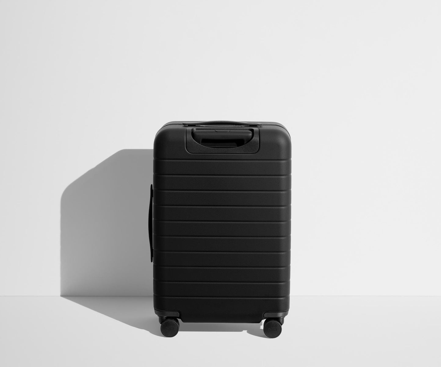 The Bigger Carry-On Flex in Jet Black