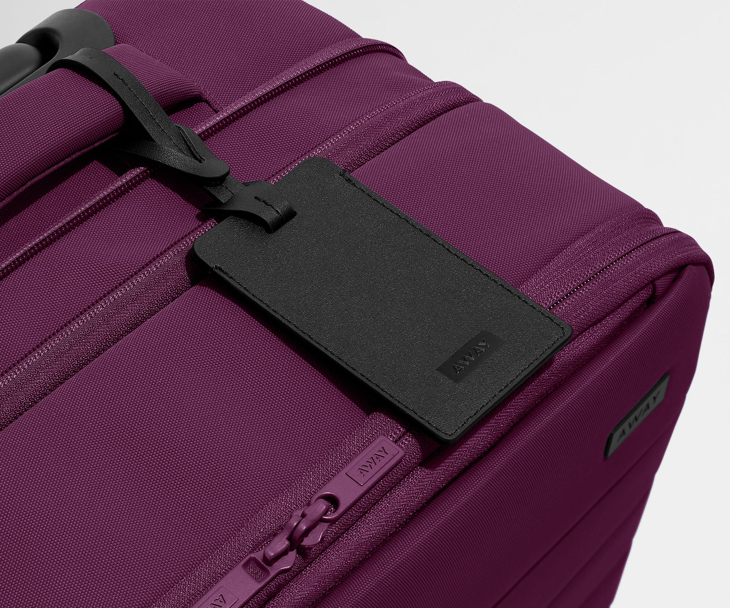 The Softside Medium in Plum Purple