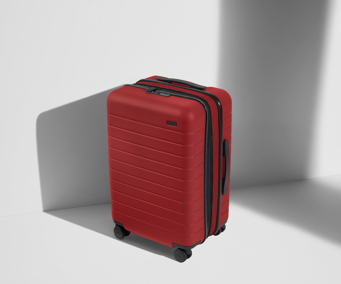 The Bigger Carry-On Flex in Tango Red