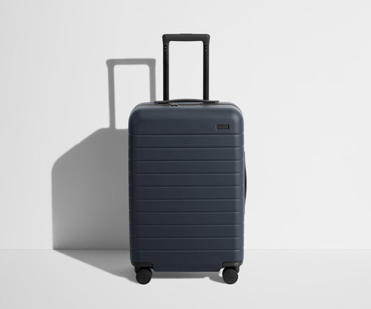 The Bigger Carry-On in Navy Blue