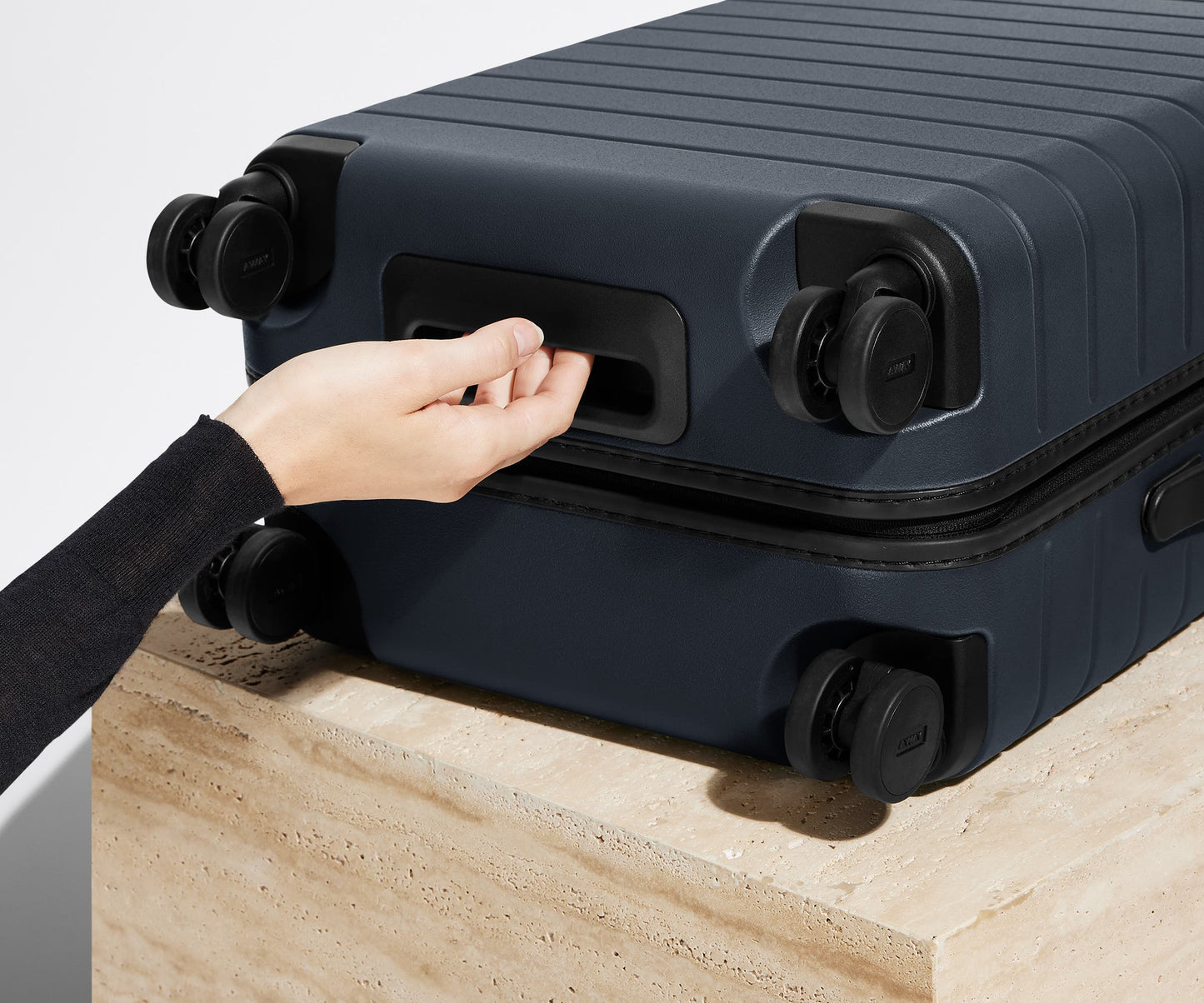 The Bigger Carry-On in Navy Blue