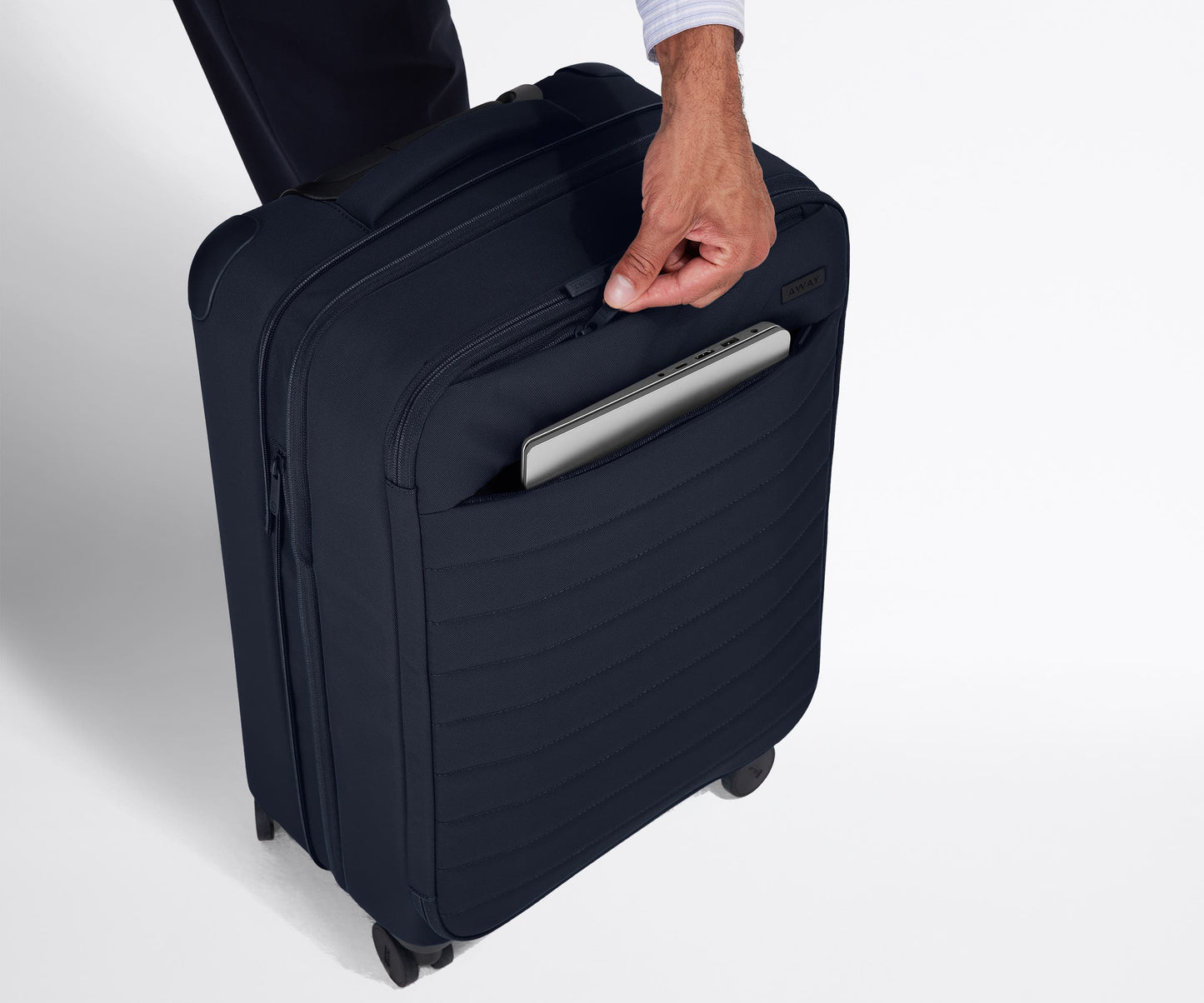 The Softside Bigger Carry-On in Navy Blue