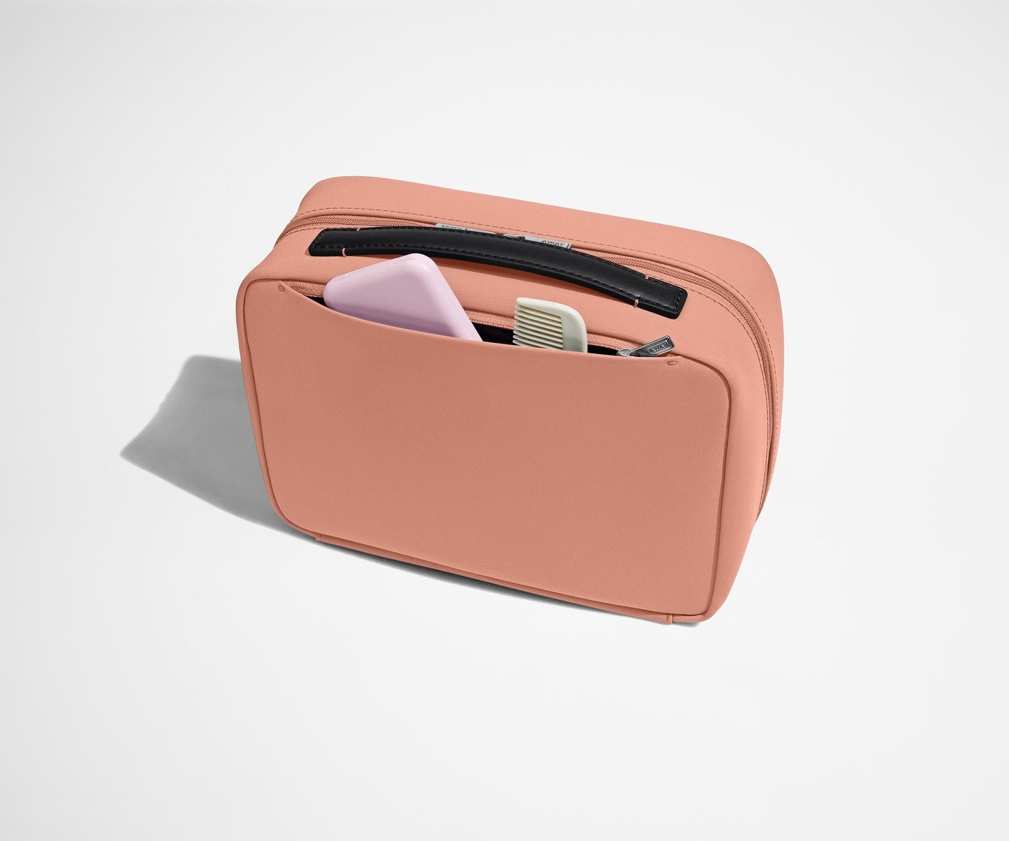 The Hanging Toiletry Bag in Clay Pink