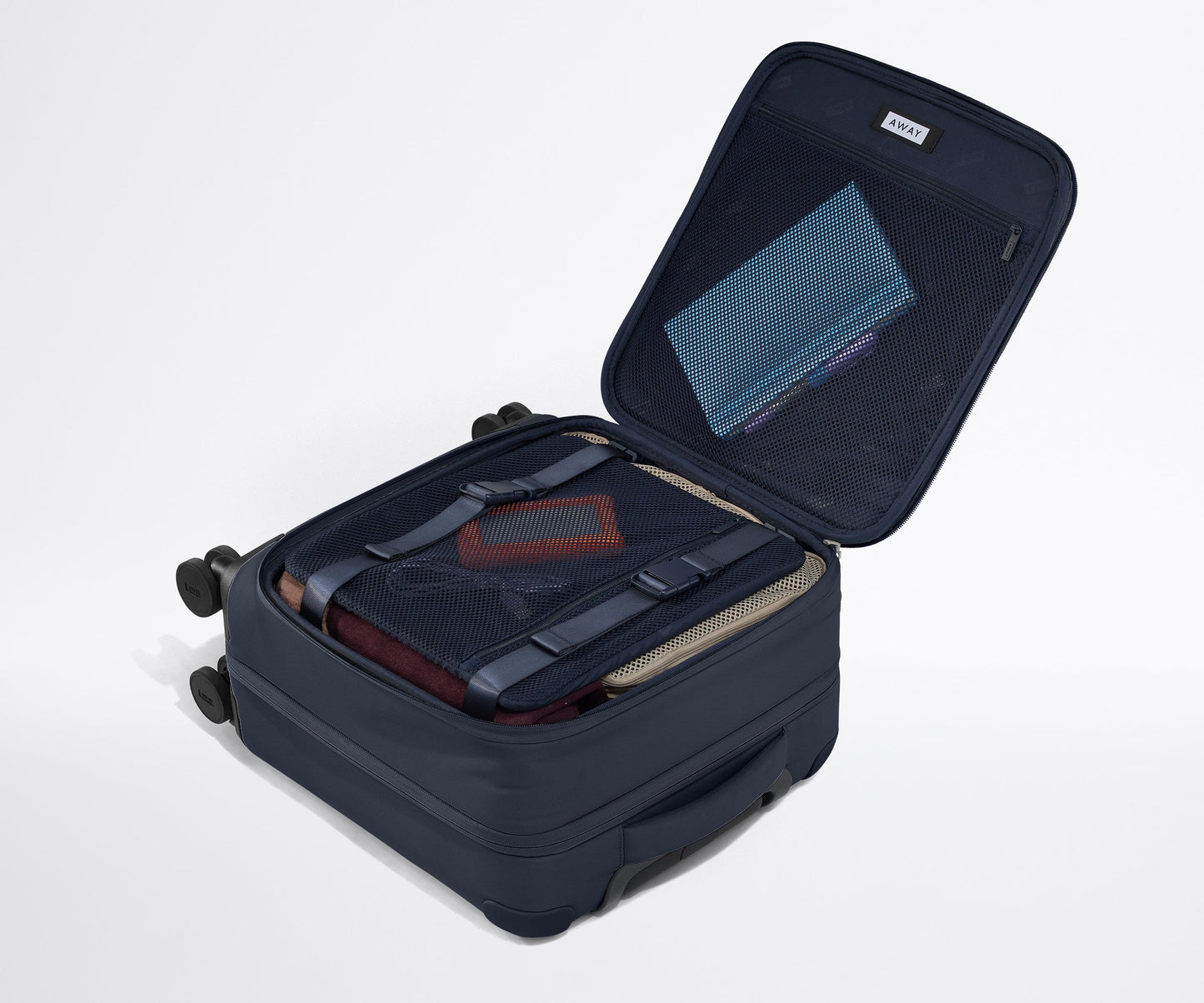 The Softside Compact Carry-On in Navy Blue