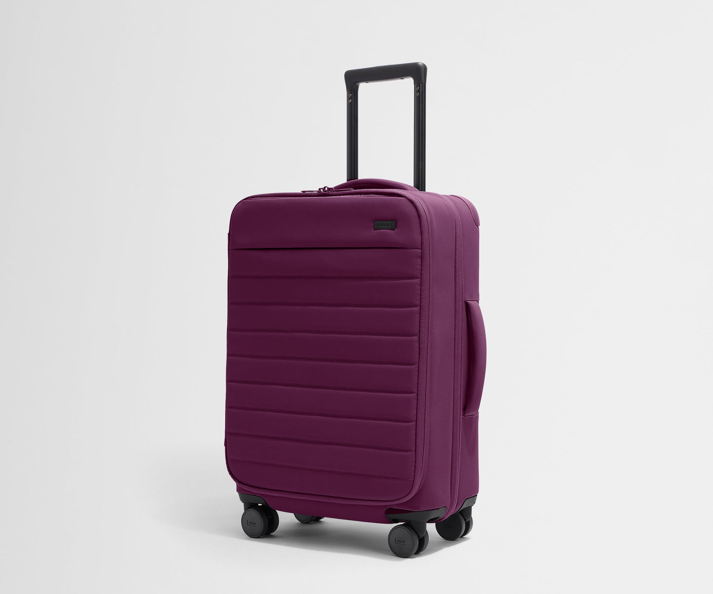 The Softside Bigger Carry-On in Plum Purple
