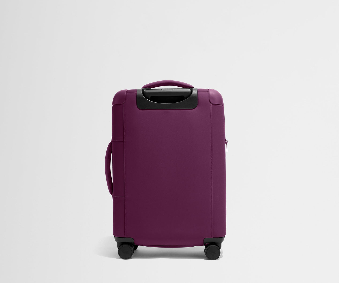 The Softside Bigger Carry-On in Plum Purple