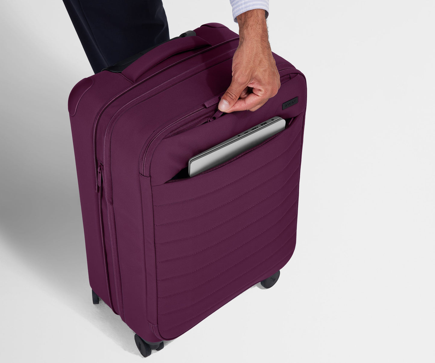 The Softside Bigger Carry-On in Plum Purple