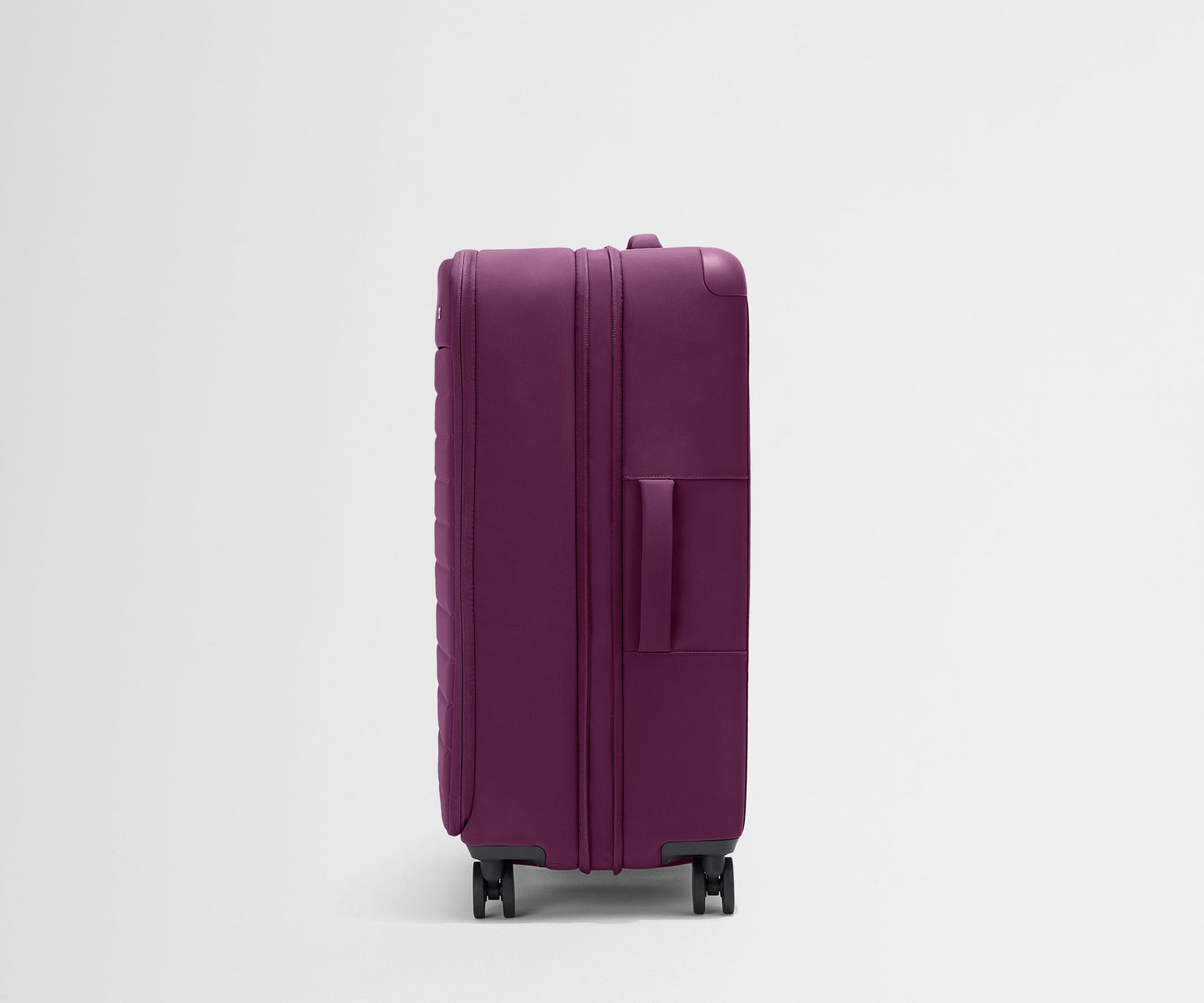 The Softside Large in Plum Purple
