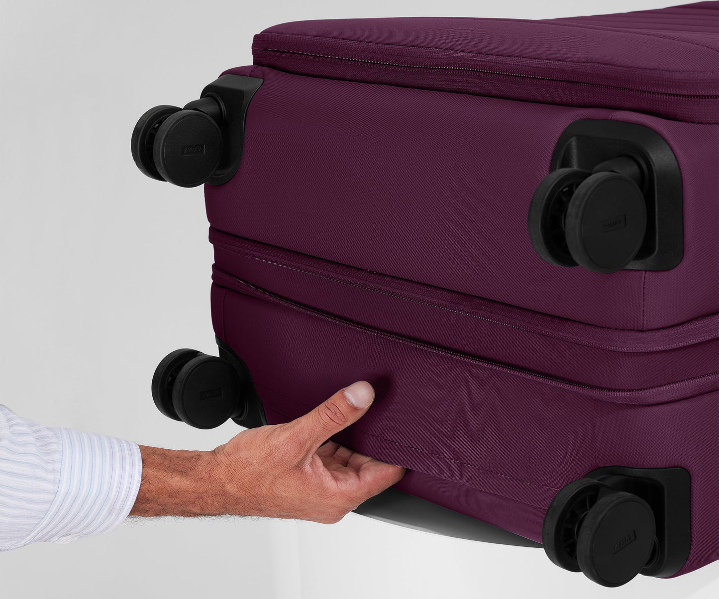 The Softside Large in Plum Purple