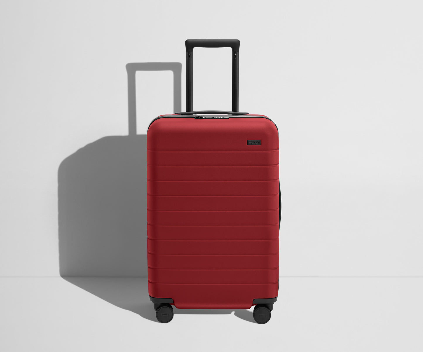 The Bigger Carry-On Flex in Tango Red